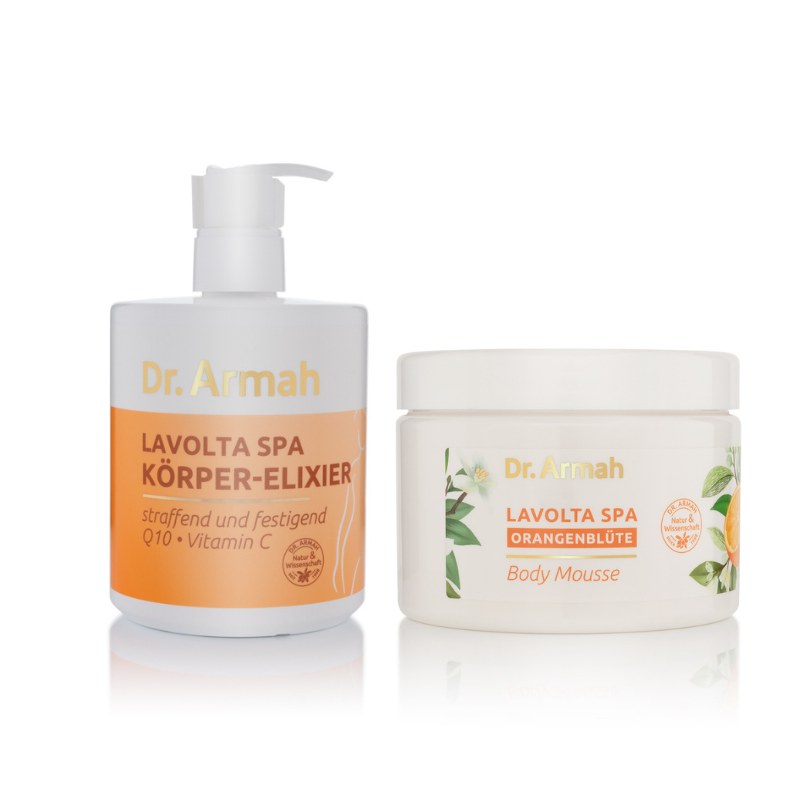 Das Dr. Armah Lavolta Pflegeset, bestehend aus einem Orangenblüten Body Mousse und einem Körper-Elixier, elegant arrangiert für ein luxuriöses Hautpflegeerlebnis.